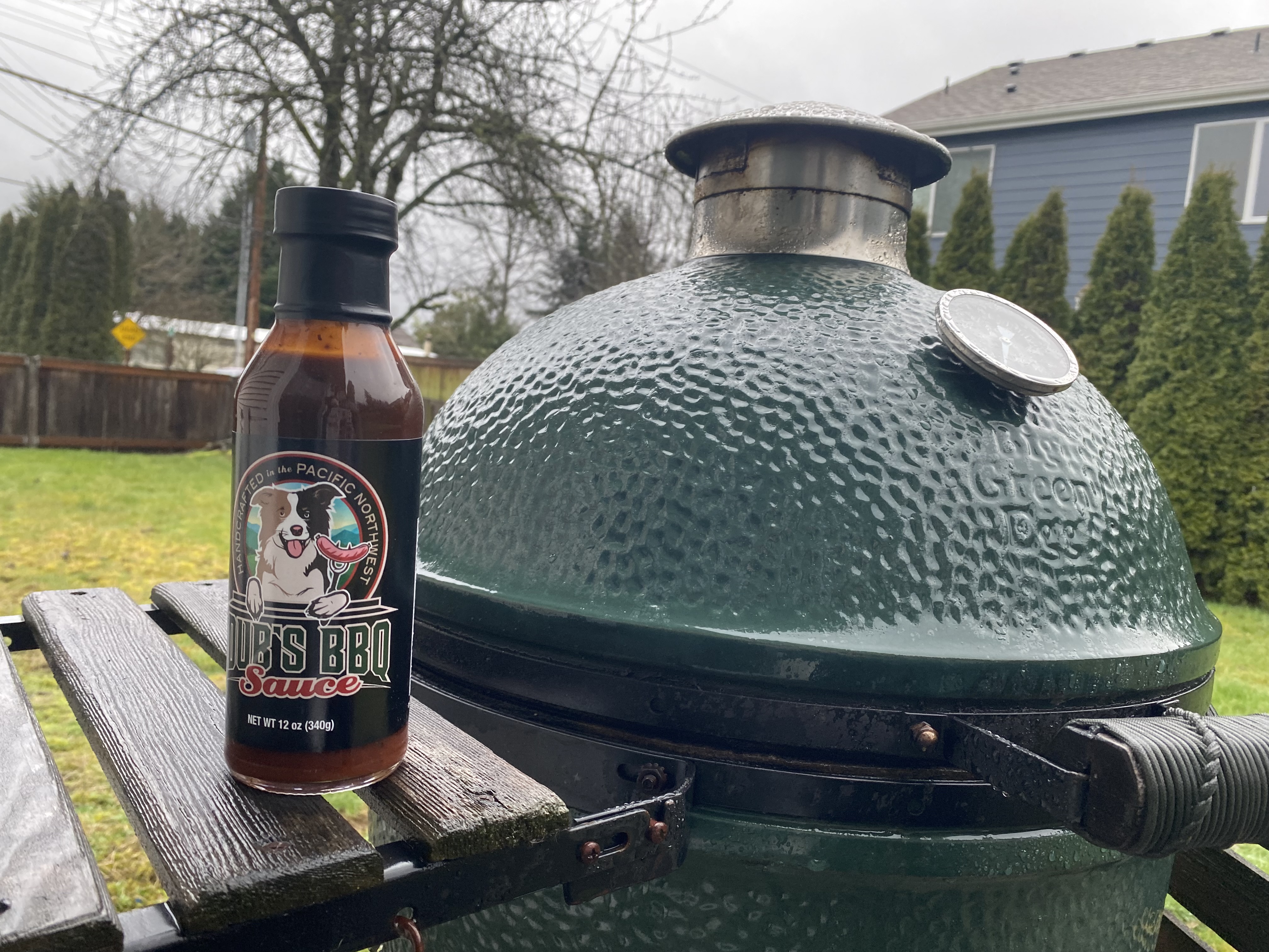 Bottle of Dub's Sauce on the Big Green Egg